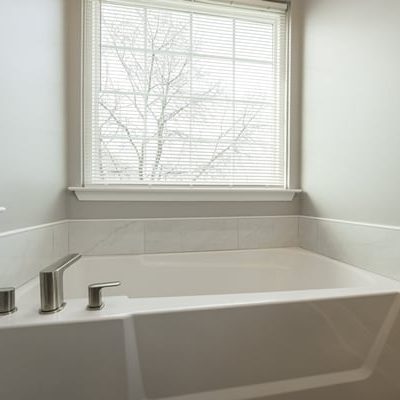 new tub in hall bathroom
